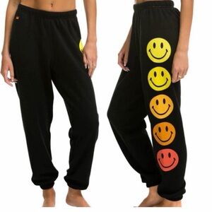 Black Aviator Nation Sweatpants with Colorful Smiley Faces.  Med